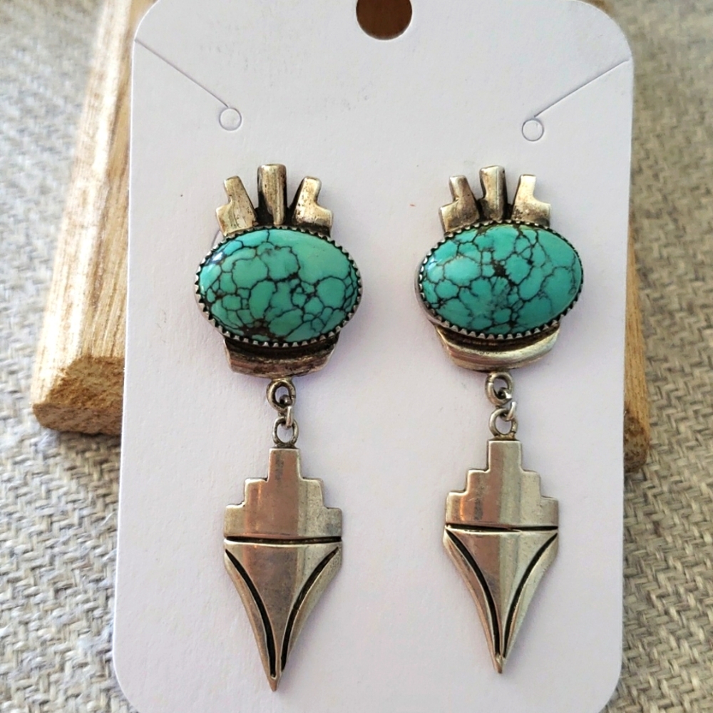 Native american sterling touquoise signed earings.